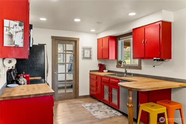 a dining room with furniture and window