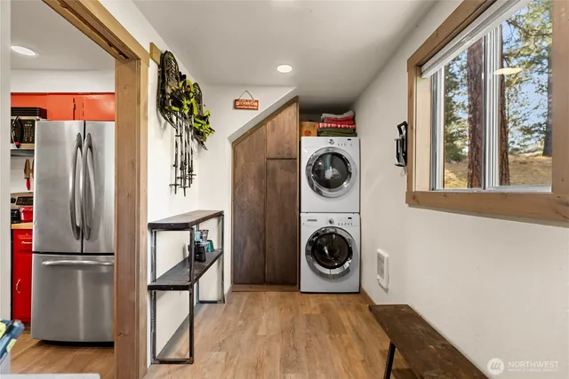 a bedroom with a bed and a table in it