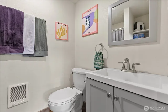 a kitchen with stainless steel appliances granite countertop a stove and a refrigerator