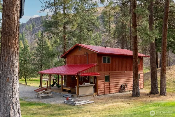 a front view of a house with a garage