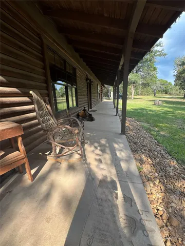 a bedroom with bed and window