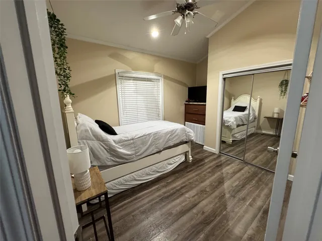 a bathroom with a shower a toilet and a sink