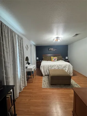 a view of a backyard of the house