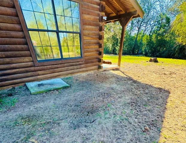 a view of door with wooden fence