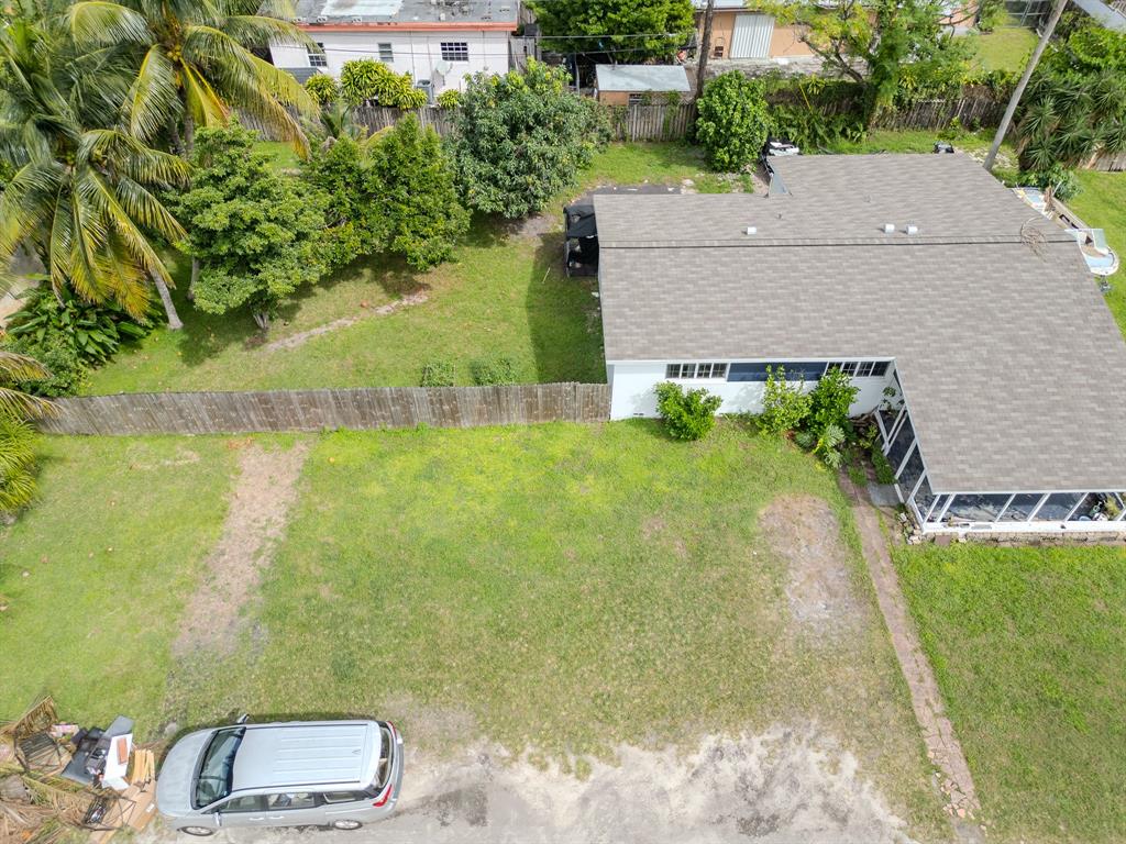 2011 Southwest 97th Terrace Miramar, FL 33025 - Photo 20 of 27 an aerial view of a house with a yard