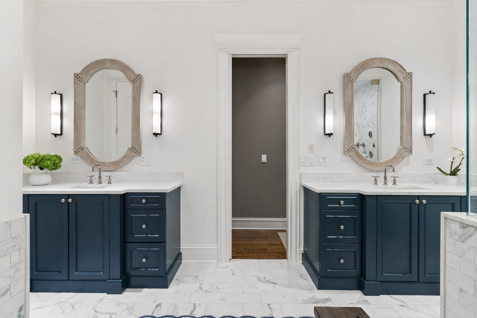 1410 West Byron Street Chicago, IL 60613 - Photo 19 of 40 a bathroom with a sink and a mirror