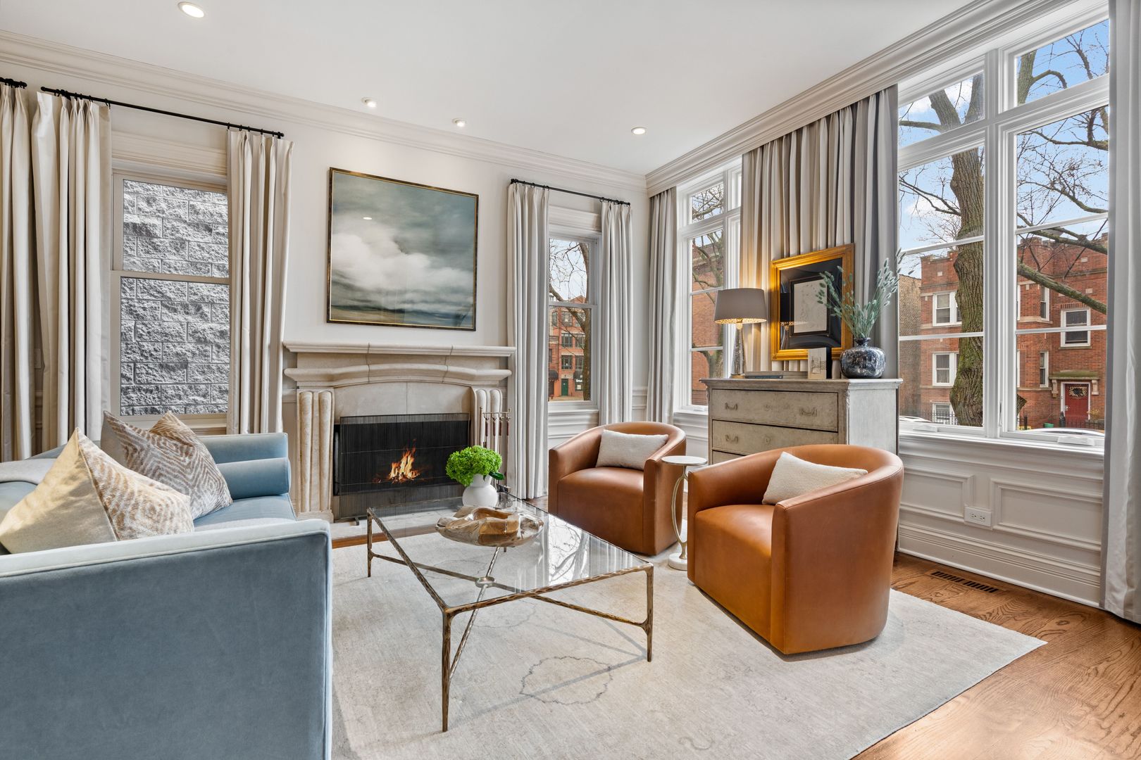 1410 West Byron Street Chicago, IL 60613 - Photo 2 of 40 a living room with furniture a fireplace and a large window