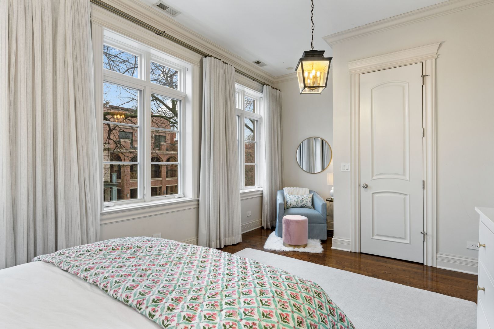 1410 West Byron Street Chicago, IL 60613 - Photo 23 of 40 a bedroom with a bed and wooden floor
