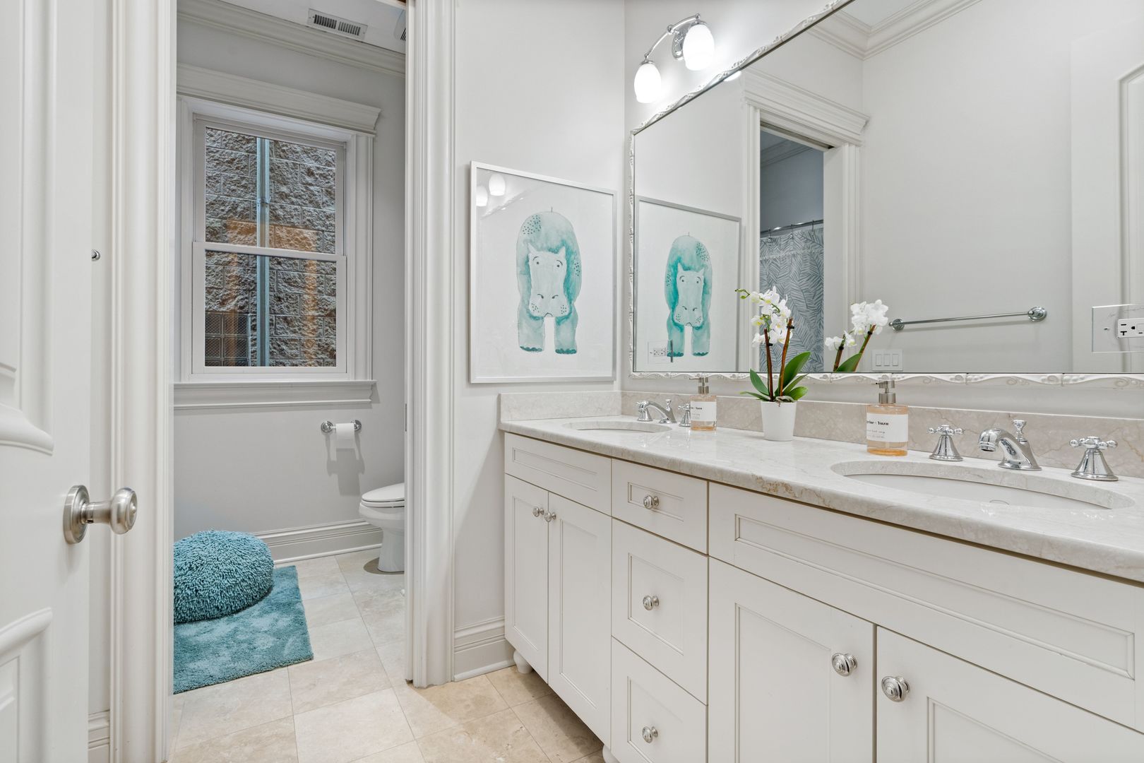 1410 West Byron Street Chicago, IL 60613 - Photo 24 of 40 a bathroom with a sink and a toilet