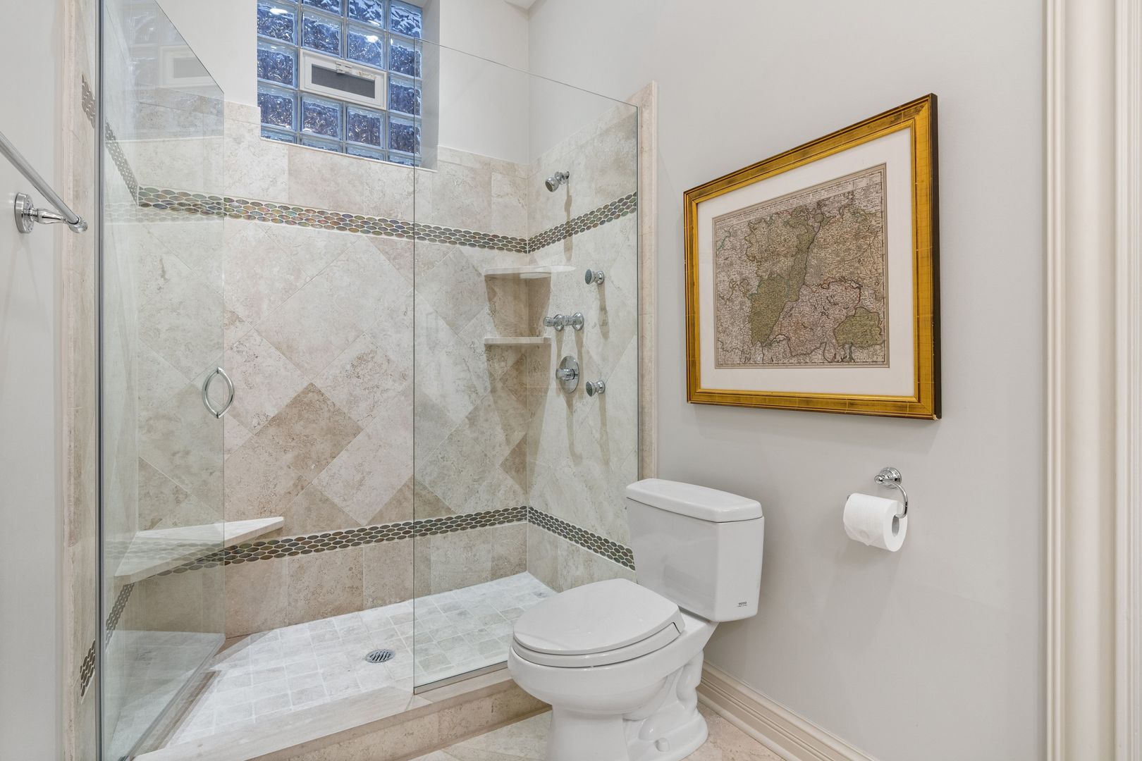 1410 West Byron Street Chicago, IL 60613 - Photo 32 of 40 a bathroom with a toilet and a shower