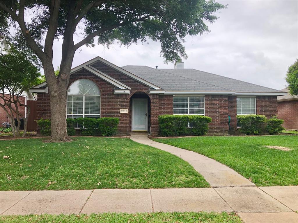 11409 Canoe Road Frisco, TX 75035 - Photo 1 of 19 a front view of a house with a yard