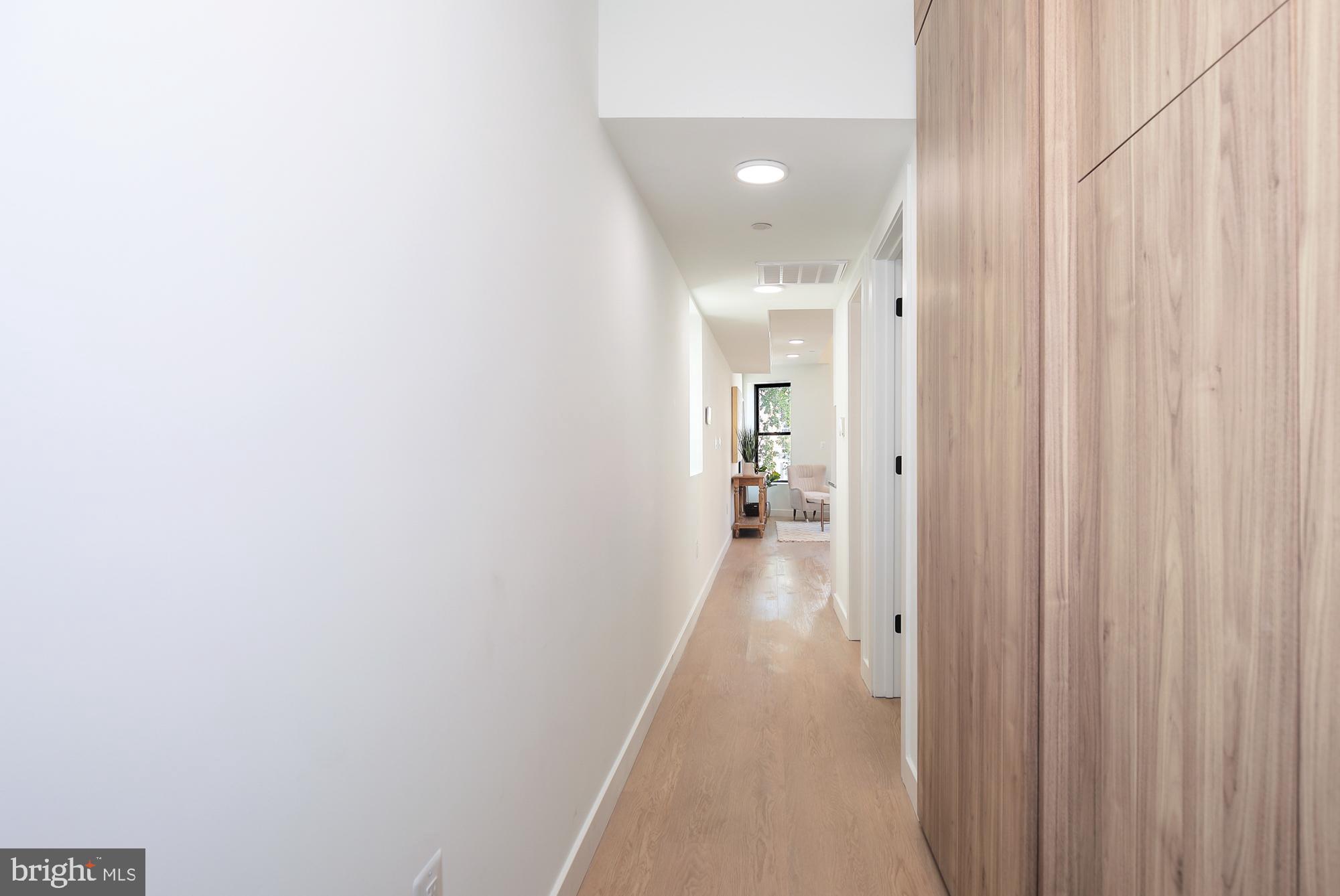 304 Florida Avenue Northwest, Unit 1 Washington, DC 20001 - Photo 12 of 26 a view of a bathroom from the hallway