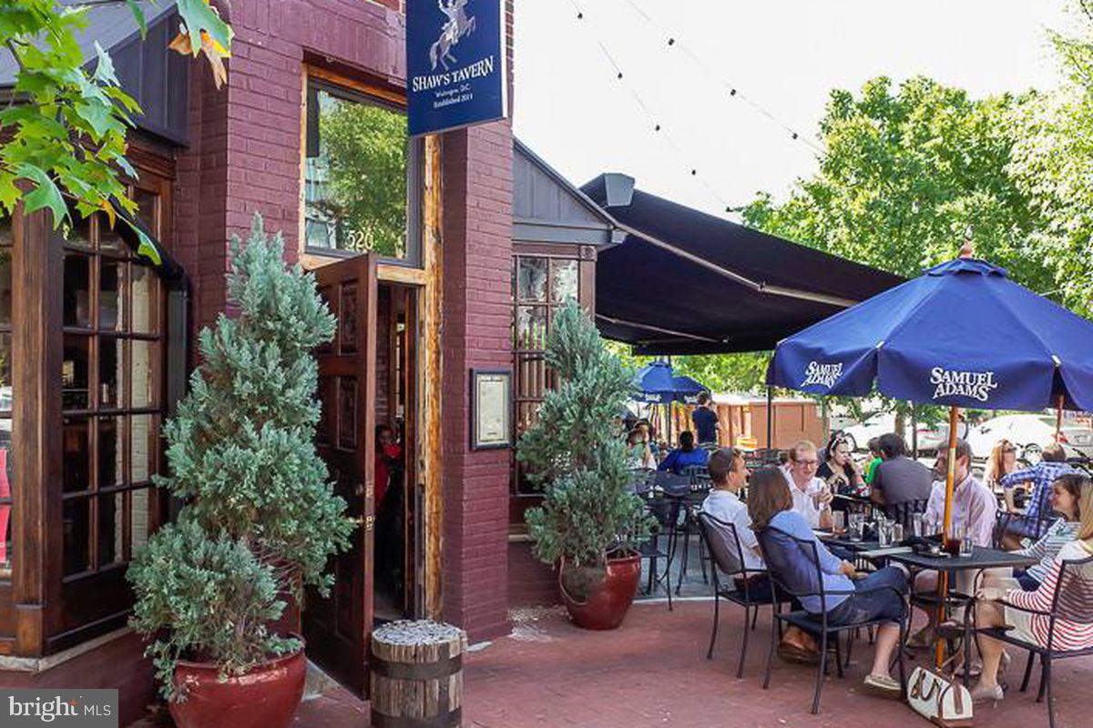 304 Florida Avenue Northwest, Unit 1 Washington, DC 20001 - Photo 24 of 26 a view of the patio with chairs and potted plants