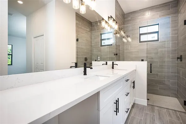 a bathroom with a sink and a vanity