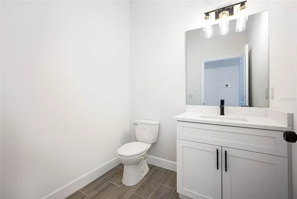 a view of small space with wooden floor