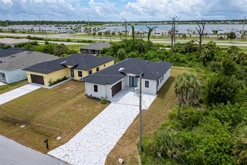 183 Sesame Road East Rotonda West, FL 33947 - Photo 49 of 59 an aerial view of a house with outdoor space