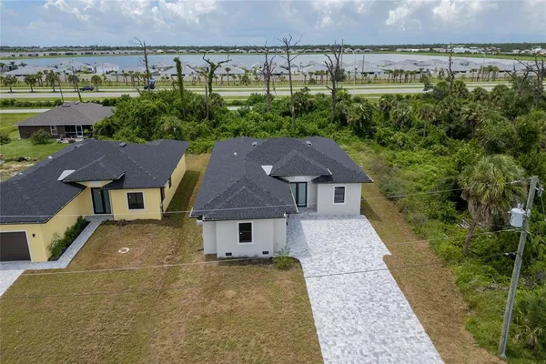 a house with trees in the background