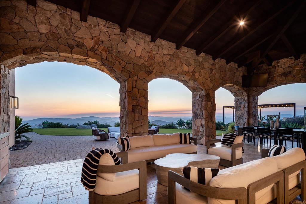 18000 Sunset Point Road Poway, CA 92064 - Photo 25 of 36 a outdoor space with patio furniture and a potted plant