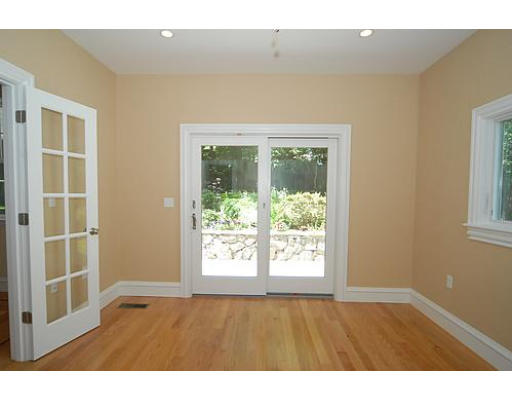 42 Nickerson Road Newton, MA 02467 - Photo 17 of 28 a view of an empty room with wooden floor and a window