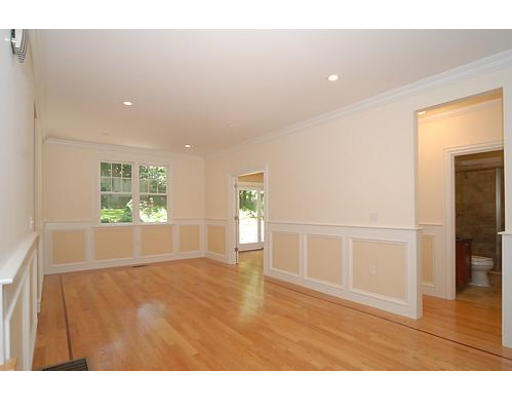 42 Nickerson Road Newton, MA 02467 - Photo 20 of 28 a view of an empty room with wooden floor and a window