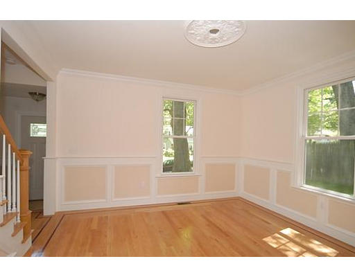 42 Nickerson Road Newton, MA 02467 - Photo 10 of 28 a view of an empty room with wooden floor and a window