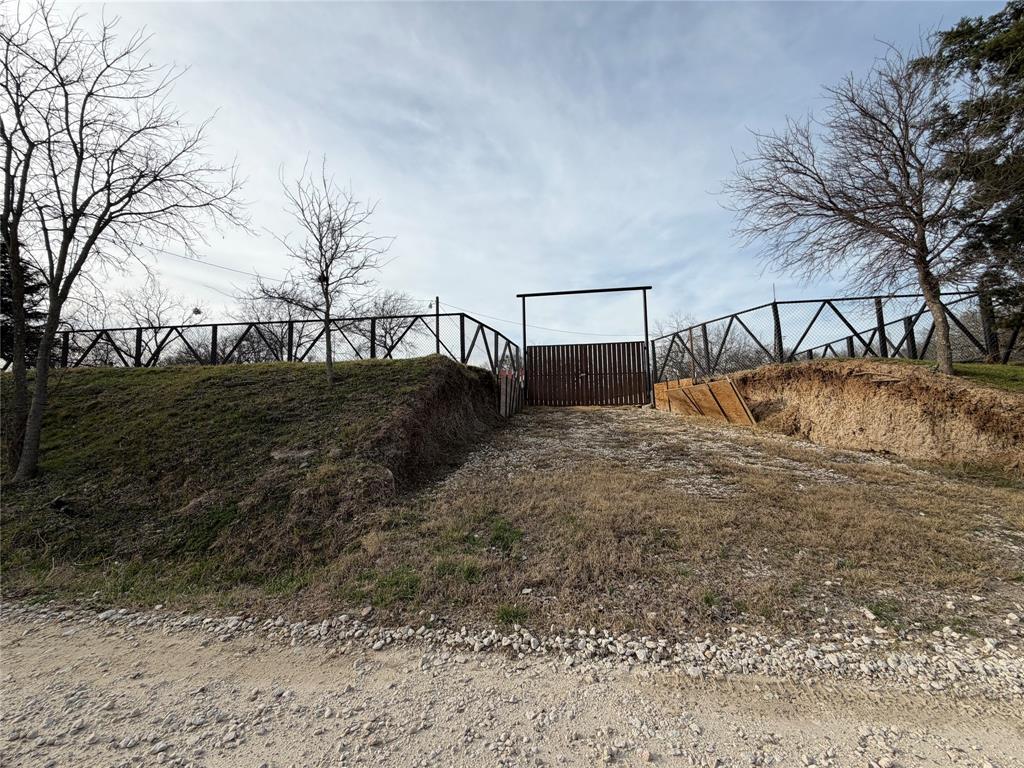 a view of a backyard of the house