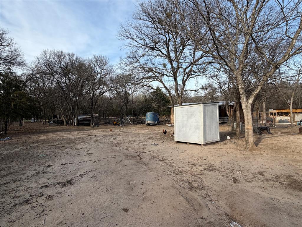 2552 Northwest 1090 Road Corsicana, TX 75110 - Photo 22 of 23 a view of outdoor space with trees