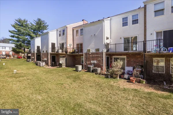 a view of a patio with a big yard