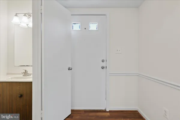a view of a hallway with closet