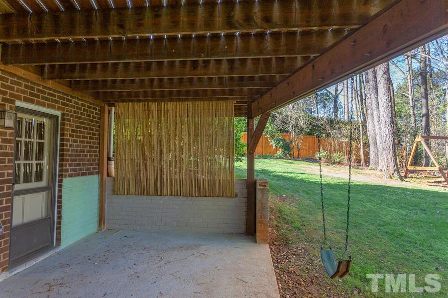 7533 Milestone Court Raleigh, NC 27615 - Photo 35 of 51 a view of backyard with green space