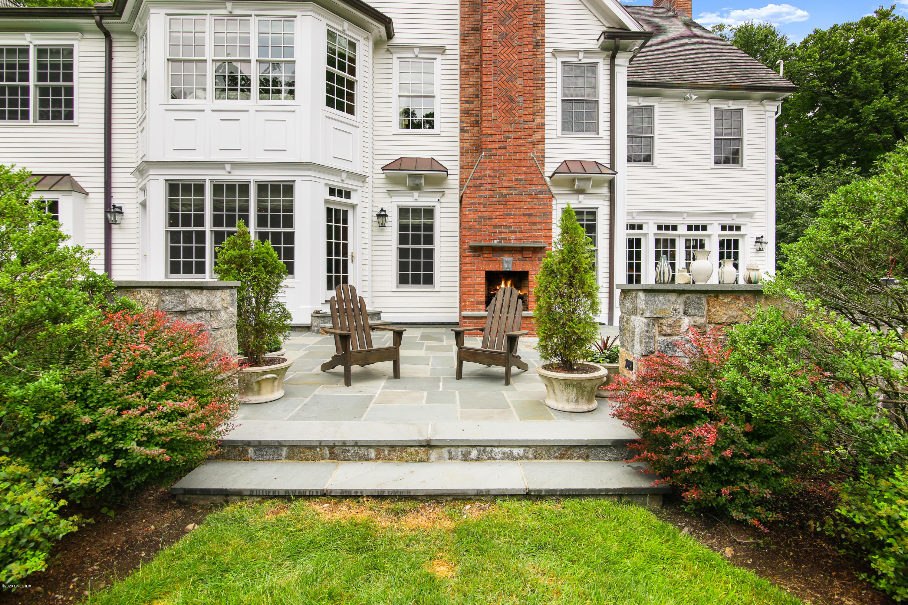 50 Byfield Lane Greenwich, CT 06830 - Photo 8 of 37 a view of a house with patio