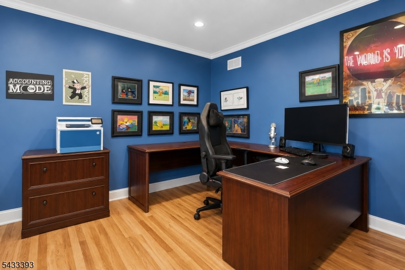 33 Stanton Street Clark, NJ 07066 - Photo 12 of 37 a room with furniture and a flat screen tv