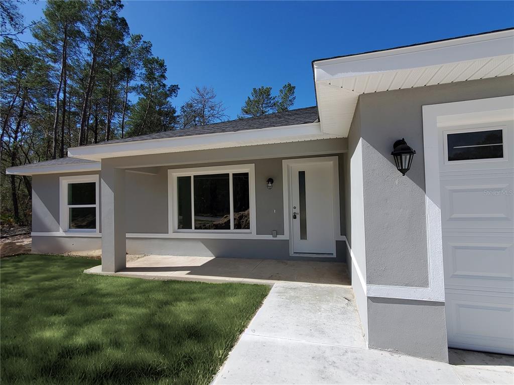 9529 Bahia Road Ocala, FL 34472 - Photo 2 of 20 a view of house that has a window