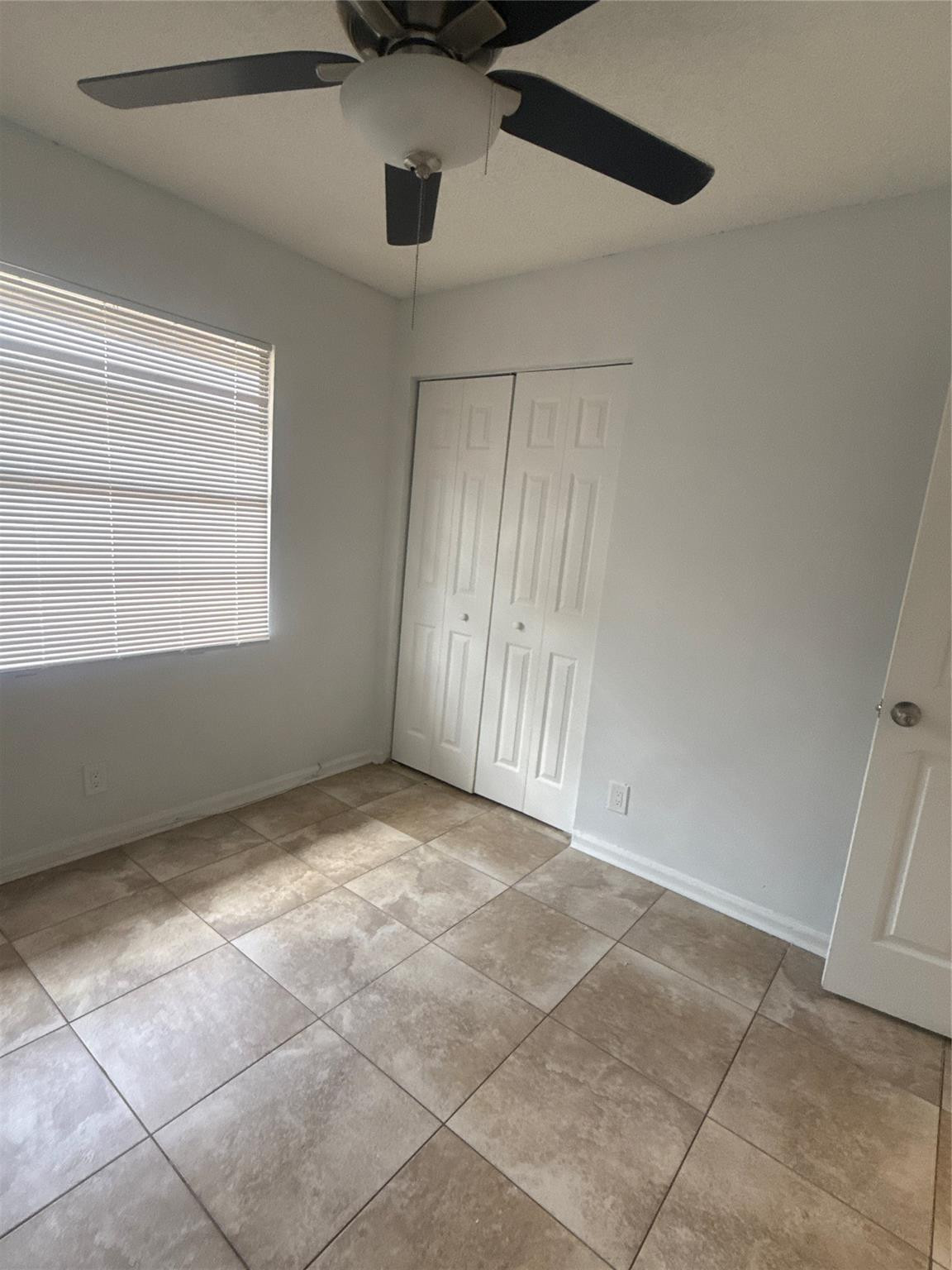 7427 Southwest 13th Street North Lauderdale, FL 33068 - Photo 25 of 49 a view of an empty room with a window