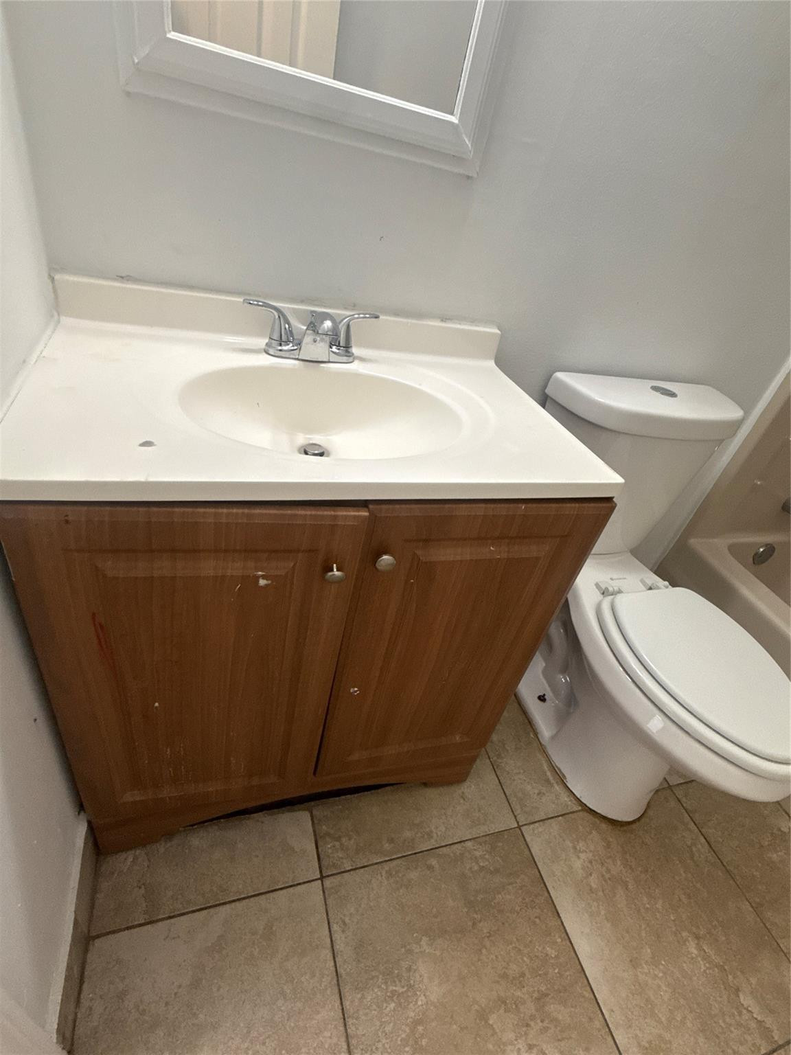 7427 Southwest 13th Street North Lauderdale, FL 33068 - Photo 27 of 49 a bathroom with a sink and a toilet