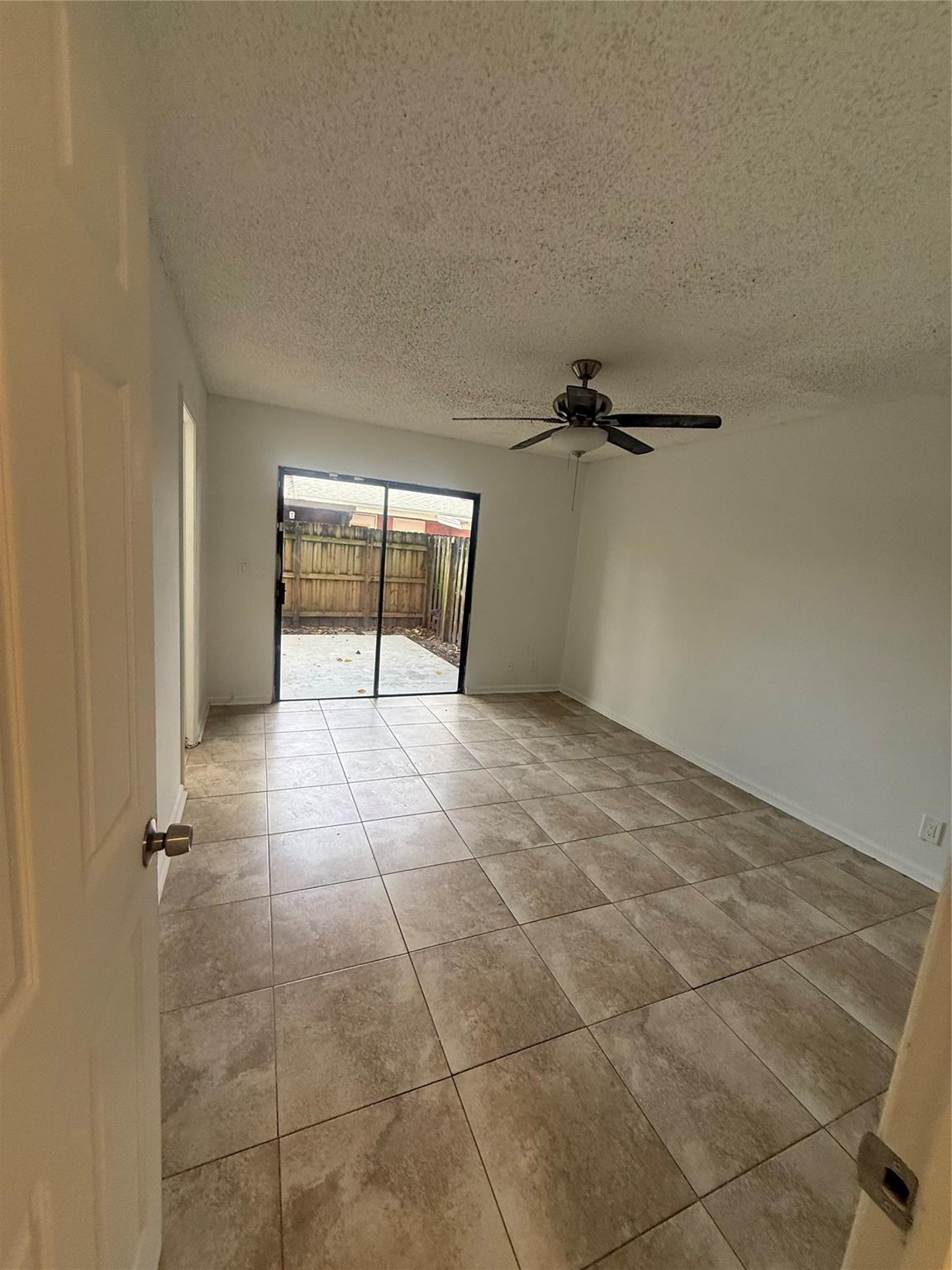 7427 Southwest 13th Street North Lauderdale, FL 33068 - Photo 3 of 49 a view of an empty room with a window