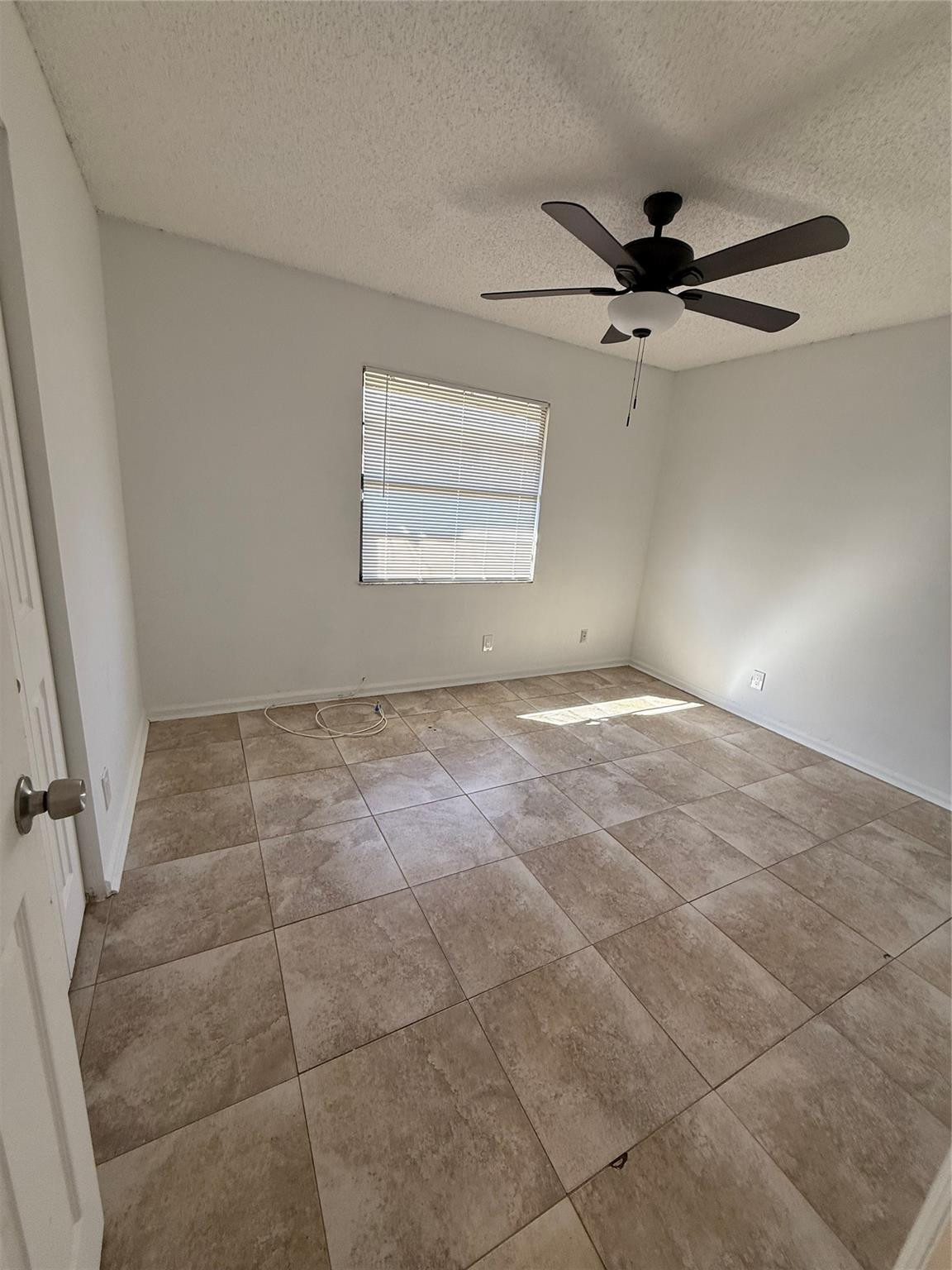 7427 Southwest 13th Street North Lauderdale, FL 33068 - Photo 48 of 49 a view of an empty room with a window