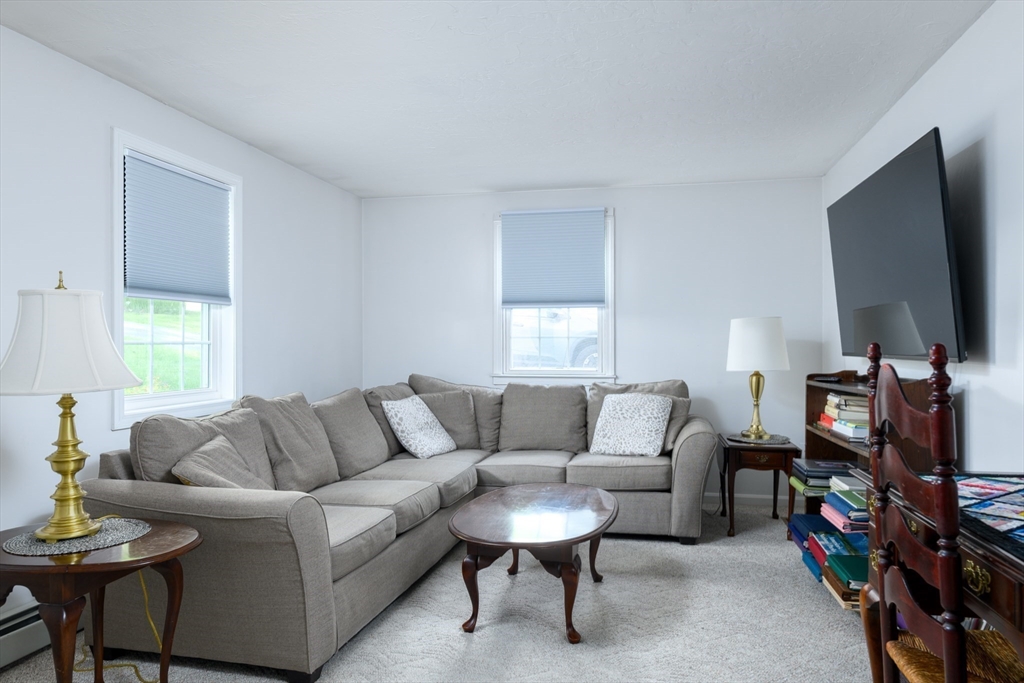 32 Westview Road Worcester, MA 01602 - Photo 9 of 18 a living room with furniture and a flat screen tv