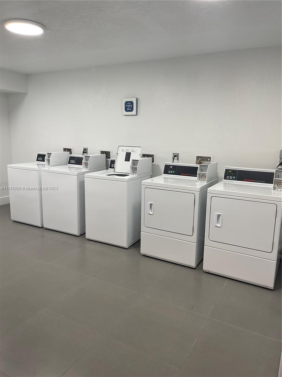 500 Northeast 26th Street, Unit 4B Miami, FL 33137 - Photo 4 of 4 a utility room with dryer and washer