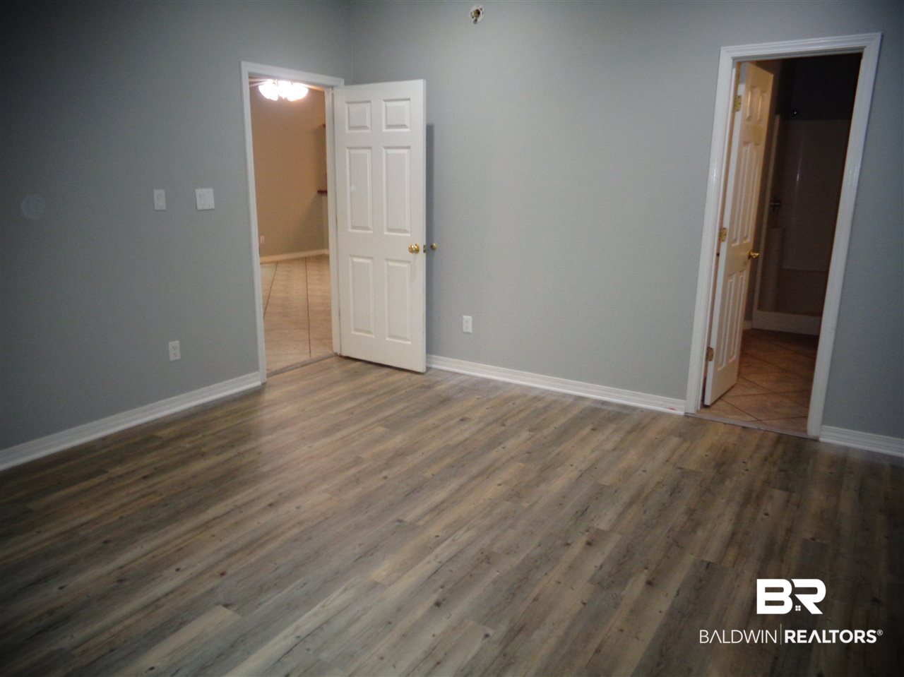 27020 Lake Road Orange Beach, AL 36561 - Photo 12 of 30 Master bedroom.