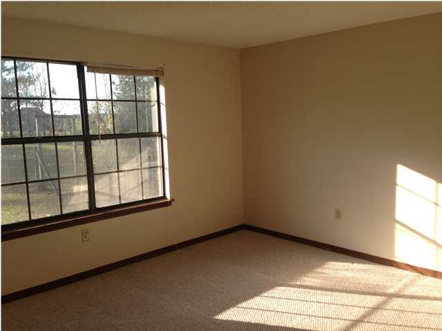 5806 Flamingo Road Crestview, FL 32539 - Photo 14 of 19 a view of a room that has a window in it