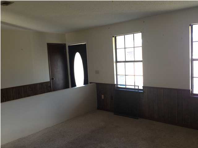 5806 Flamingo Road Crestview, FL 32539 - Photo 8 of 19 a living room with a window
