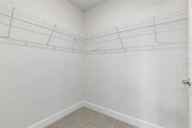 a view of a room with racks on the wall