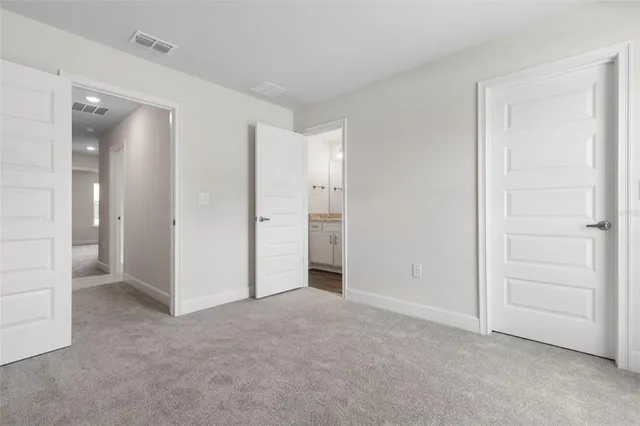 wooden floor and closet in a room