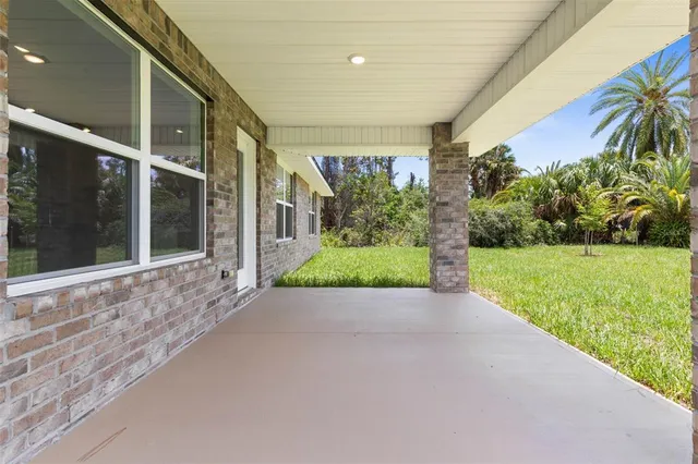 a view of porch with a yard