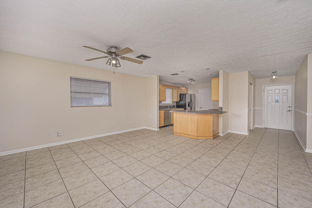 1132 Southeast Palm Beach Road Port St. Lucie, FL 34952 - Photo 4 of 17 1132 SE Palm Beach Rd - WEB - 4