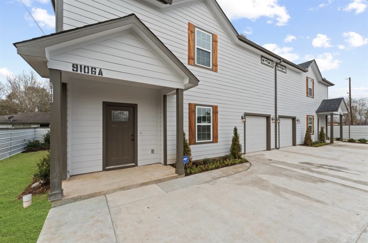 5140 Mallow Street Houston, TX 77033 - Photo 2 of 23 a front view of a house with a yard