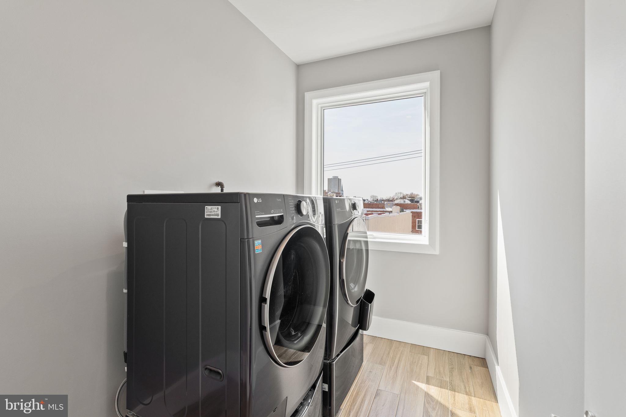 519 Bainbridge Street, Unit A Philadelphia, PA 19147 - Photo 32 of 44 a utility room with dryer and washer