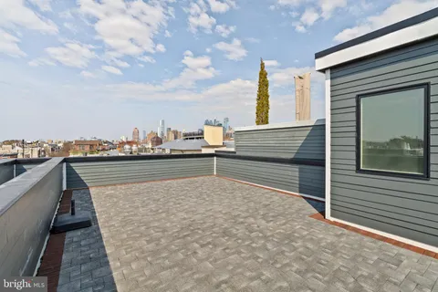 a view of a terrace with wooden floor