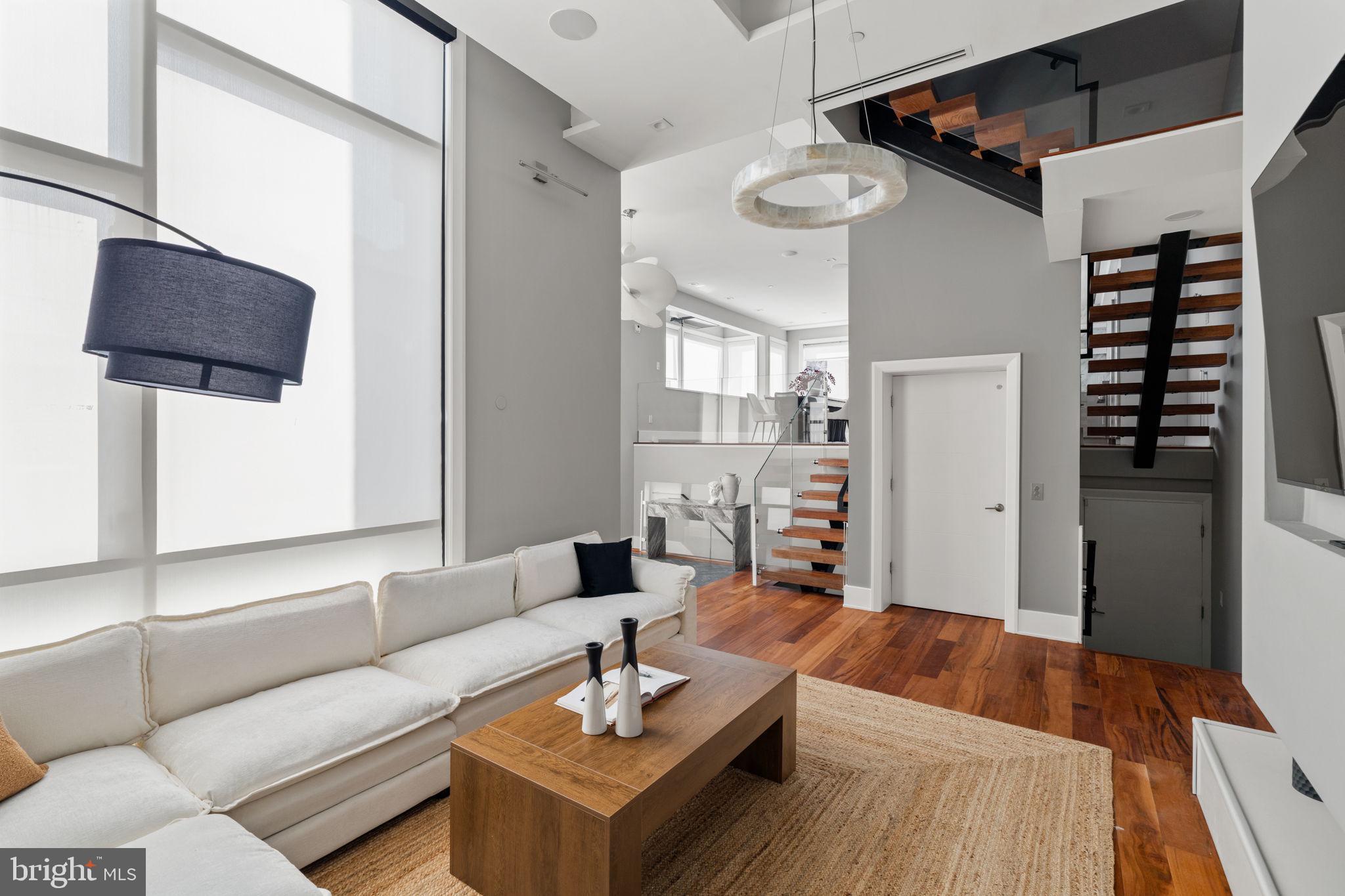 519 Bainbridge Street, Unit A Philadelphia, PA 19147 - Photo 6 of 44 a living room with furniture and wooden floor